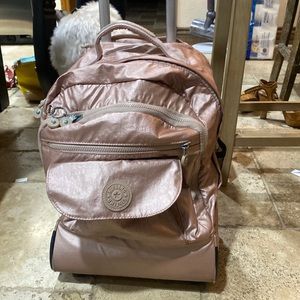 Rolling back back rose gold